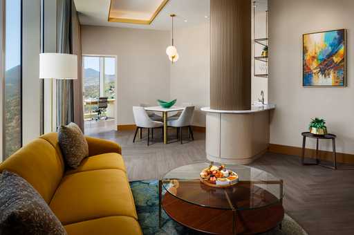 Sunrise Suite Living Room, Dining Room, Kitchenette and Desk at Jamul Casino Resort